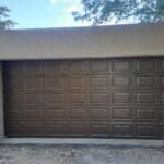 Aluzinc bronze double garage door exterior with block panel finish