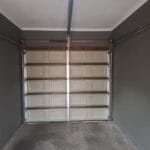 Aluzinc bronze single garage door interior with block panel design