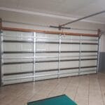 Aluzinc brown double garage door with block panel design interior view