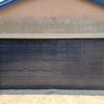Aluzinc charcoal double garage door exterior with modern block design