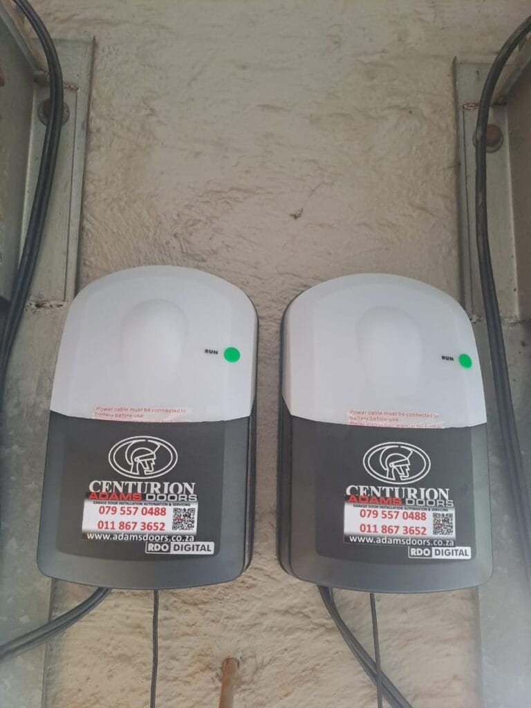 Centurion RDO Digital dual roll-up garage door motors installed side by side